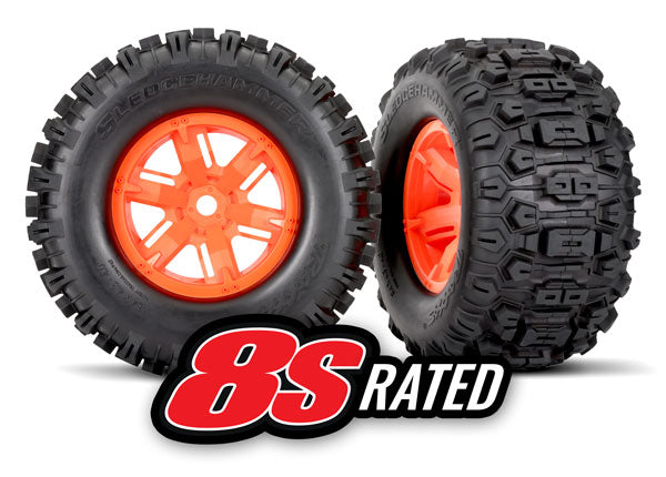 Traxxas Tires & wheels, assembled, glued (X-Maxx® orange wheels, Sledgehammer® tires, foam inserts) (left & right) (2) *SOLD OUT*